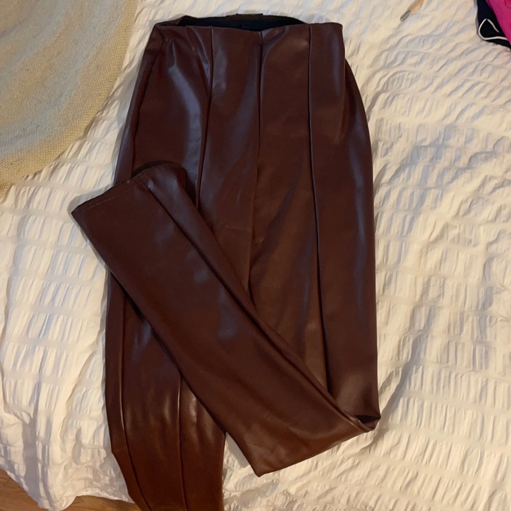 Brown faux leather pants with split hem